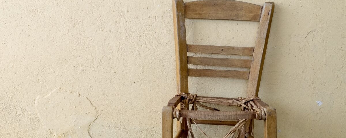 brown wooden ladder back chair